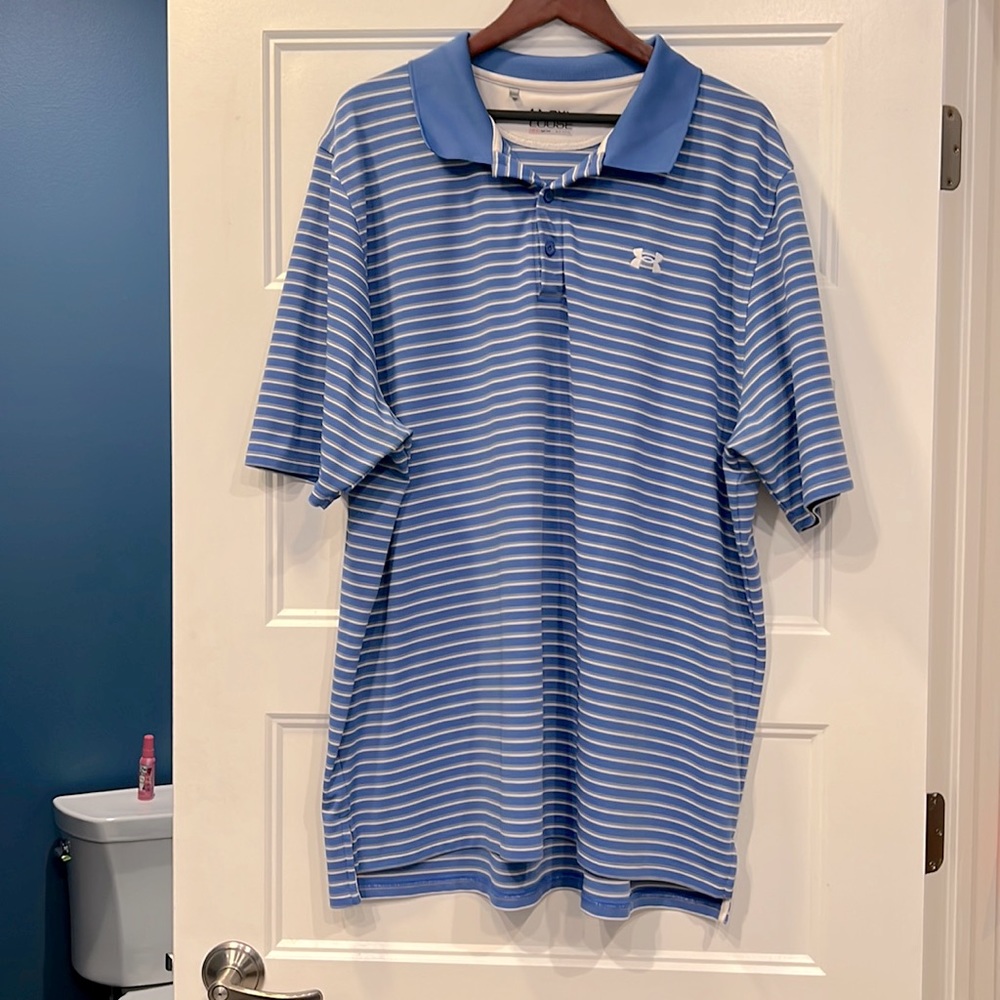 A handsome blue and white Under Armour mens polo shirt